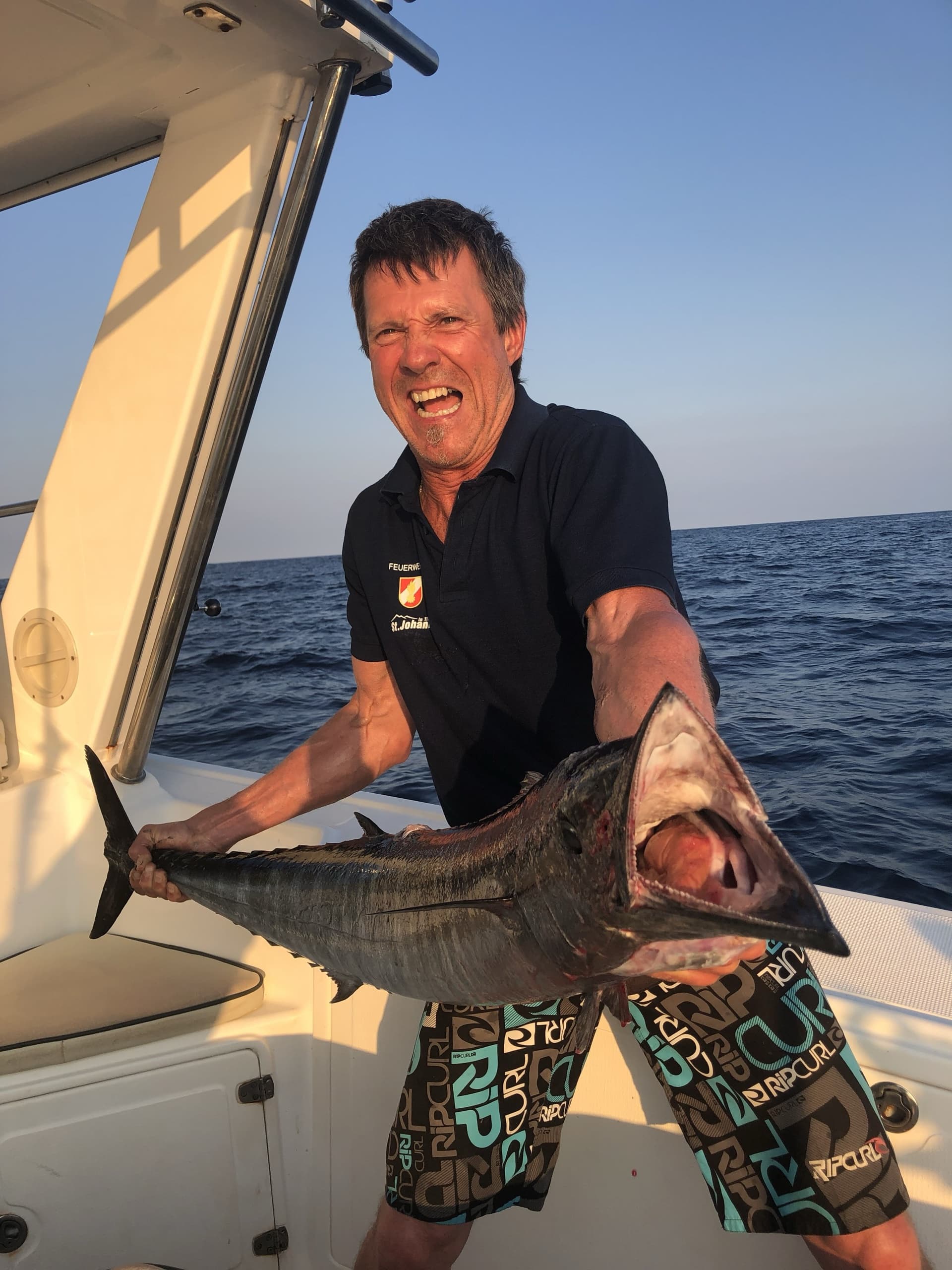 A wahoo brought over the rail on the boat off Mozambique